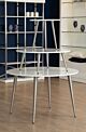 The Moderne round table is a white-topped table with stainless steel or brass finished legs that provide excellent stability and durability.  Dimensions : Small Table: 20