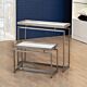 The Moderne nesting table is a white-topped table with stainless steel or brass finished legs that provide excellent stability and durability.   Dimensions : Nesting Table: 39