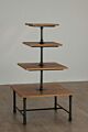 The Soho 4-Tier Square Table comes in a distressed pine or white finish and metal base. This stylish display is perfect for showcasing your merchandise in any retail space and features multiple heights.  Dimensions : 36 L x 36